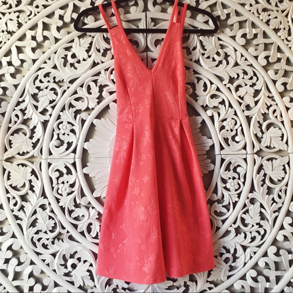 Coral dress with embossed floral print